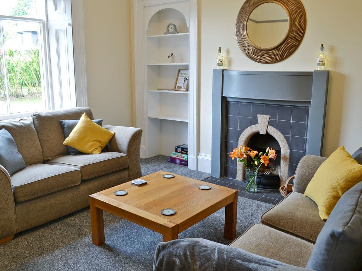 Light and airy living room with open fire | Halleaths Home Farm, Lochmaben